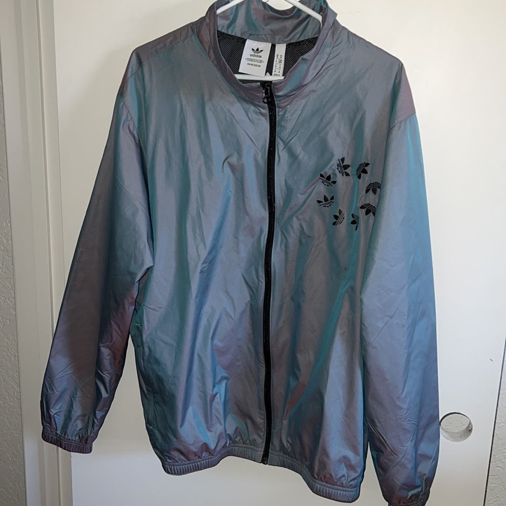 NWT Adidas lightweight wind breaker!  Gray with zip closure!